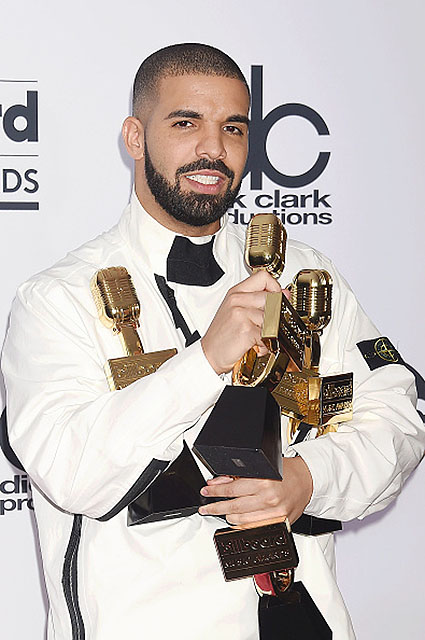 LAS VEGAS, CA - MAY 21: Rapper-singer-songwriter Drake poses with awards at the 2017 Billboard Music Awards at T-Mobile Arena on May 21, 2017 in Las Vegas, Nevada.